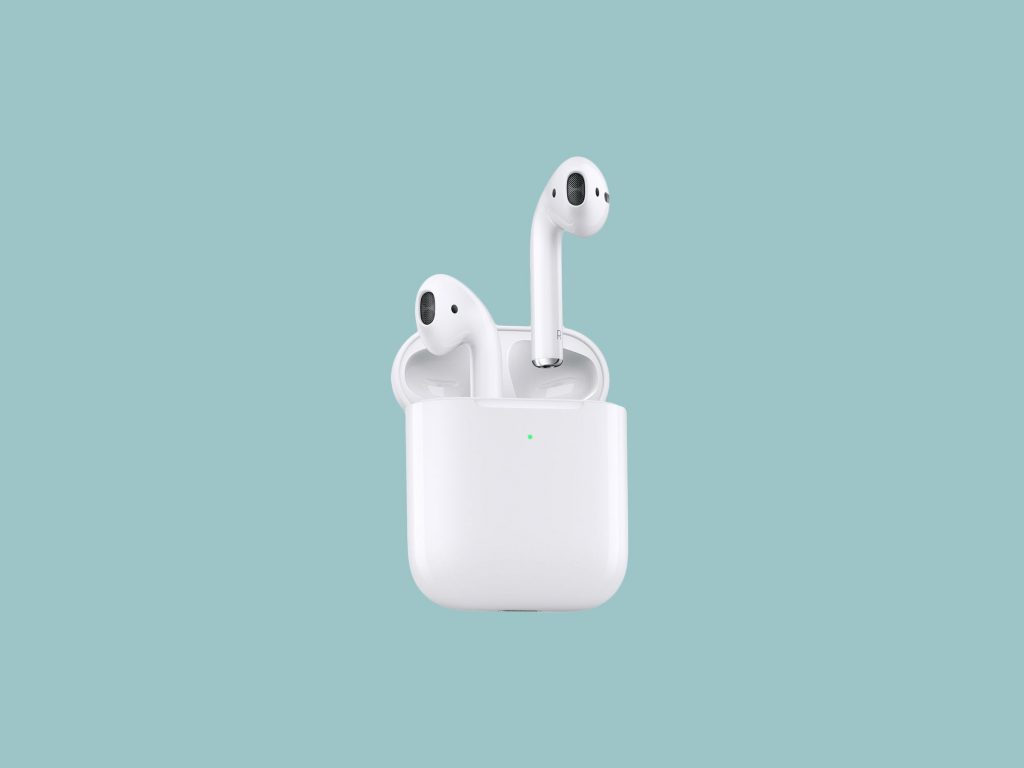 Airpods in case on blue background
