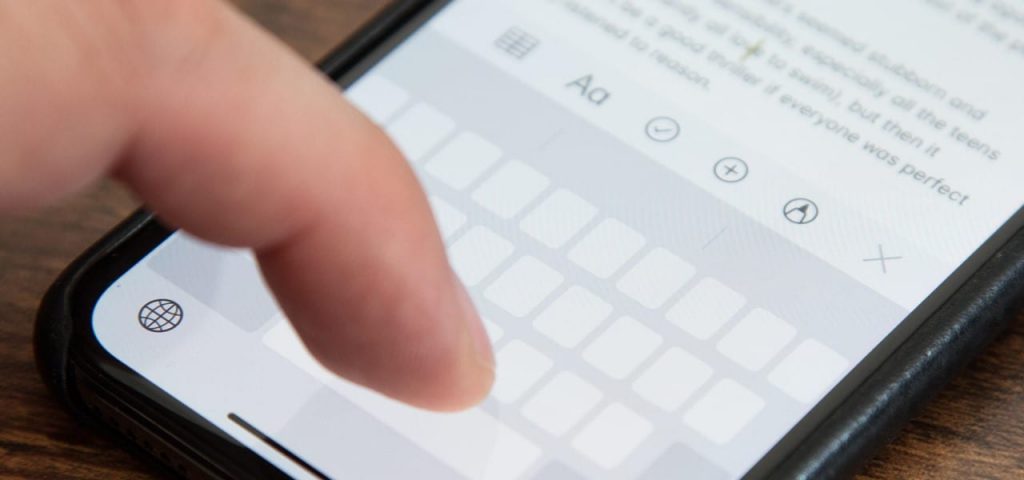 Typing on cell phone keyboard