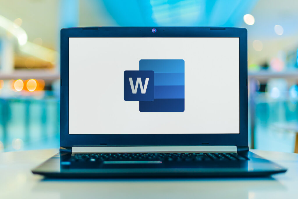 Laptop computer displaying logo of Microsoft Word, a word processor developed by Microsoft