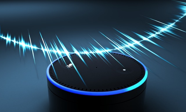 Amazon Alexa device with blue sound waves around it.