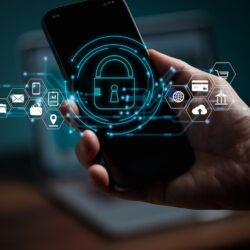 Lock icon and hand holding smart phone with virtual screen interfaces.