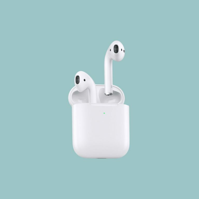 Airpods in case on blue background