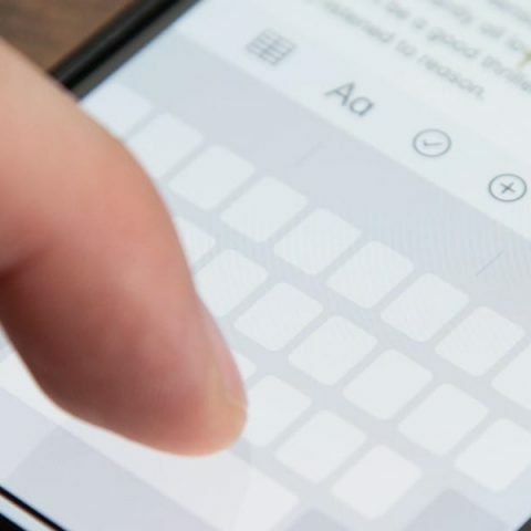 Typing on cell phone keyboard